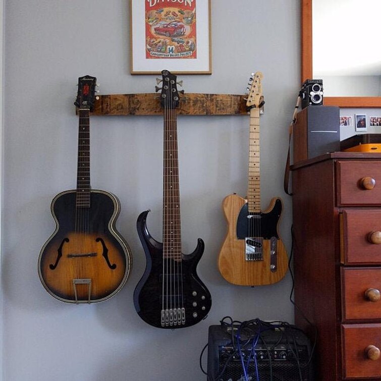 Hanging guitars online on drywall